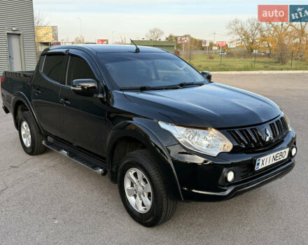 Чорний Міцубісі Л 200, об'ємом двигуна 2.44 л та пробігом 190 тис. км за 19900 $, фото 16 на Automoto.ua