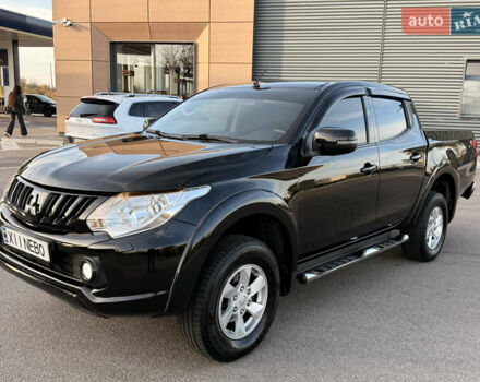 Чорний Міцубісі Л 200, об'ємом двигуна 2.44 л та пробігом 190 тис. км за 19900 $, фото 8 на Automoto.ua