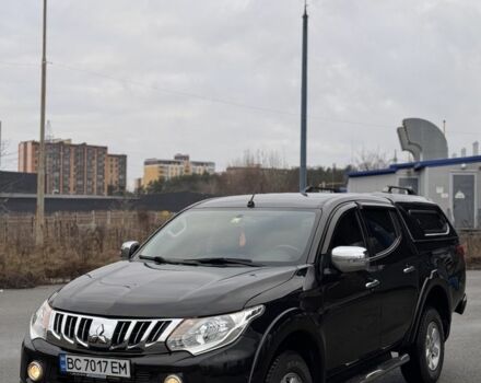 Черный Мицубиси Л 200, объемом двигателя 2.4 л и пробегом 186 тыс. км за 22200 $, фото 1 на Automoto.ua