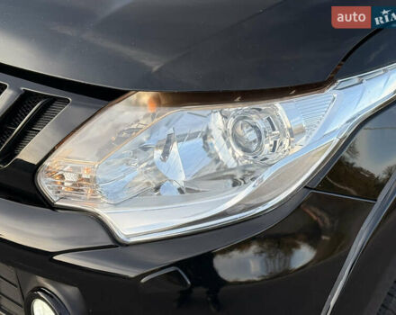 Чорний Міцубісі Л 200, об'ємом двигуна 2.44 л та пробігом 190 тис. км за 19900 $, фото 14 на Automoto.ua