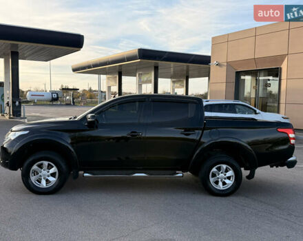 Чорний Міцубісі Л 200, об'ємом двигуна 2.44 л та пробігом 190 тис. км за 19900 $, фото 6 на Automoto.ua