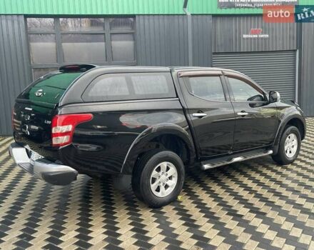 Чорний Міцубісі Л 200, об'ємом двигуна 2.4 л та пробігом 205 тис. км за 20900 $, фото 8 на Automoto.ua