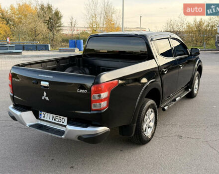 Чорний Міцубісі Л 200, об'ємом двигуна 2.44 л та пробігом 190 тис. км за 19900 $, фото 13 на Automoto.ua