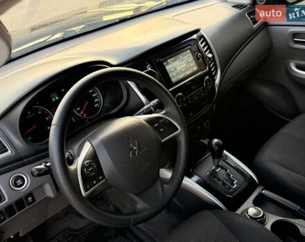 Чорний Міцубісі Л 200, об'ємом двигуна 2.44 л та пробігом 190 тис. км за 19900 $, фото 33 на Automoto.ua