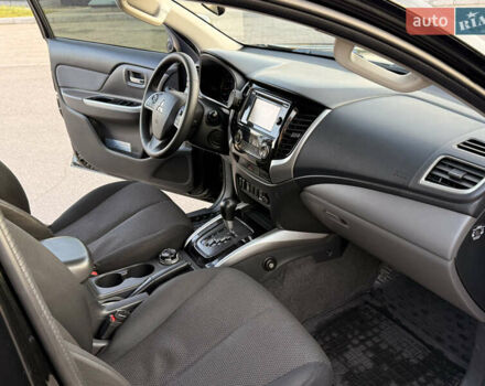 Чорний Міцубісі Л 200, об'ємом двигуна 2.44 л та пробігом 190 тис. км за 19900 $, фото 26 на Automoto.ua