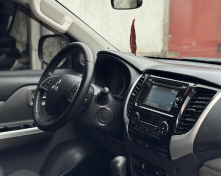 Черный Мицубиси Л 200, объемом двигателя 2.4 л и пробегом 186 тыс. км за 22200 $, фото 18 на Automoto.ua