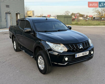 Чорний Міцубісі Л 200, об'ємом двигуна 2.44 л та пробігом 190 тис. км за 19900 $, фото 1 на Automoto.ua