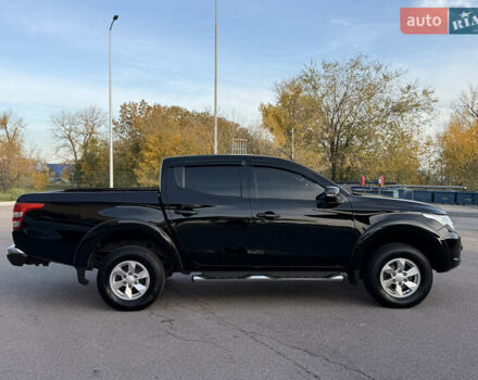 Чорний Міцубісі Л 200, об'ємом двигуна 2.44 л та пробігом 190 тис. км за 19900 $, фото 18 на Automoto.ua