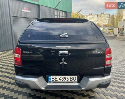 Чорний Міцубісі Л 200, об'ємом двигуна 2.4 л та пробігом 205 тис. км за 20900 $, фото 6 на Automoto.ua