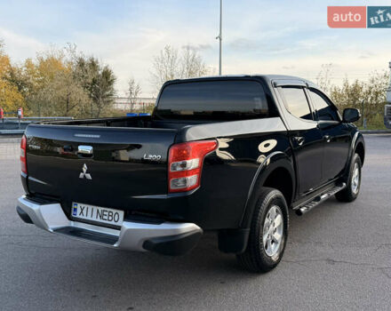 Чорний Міцубісі Л 200, об'ємом двигуна 2.44 л та пробігом 190 тис. км за 19900 $, фото 12 на Automoto.ua