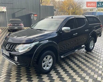 Чорний Міцубісі Л 200, об'ємом двигуна 2.4 л та пробігом 205 тис. км за 20900 $, фото 3 на Automoto.ua