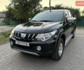 Чорний Міцубісі Л 200, об'ємом двигуна 2.44 л та пробігом 186 тис. км за 19900 $, фото 1 на Automoto.ua