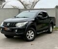 Чорний Міцубісі Л 200, об'ємом двигуна 2.4 л та пробігом 180 тис. км за 21999 $, фото 1 на Automoto.ua