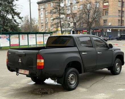 Черный Мицубиси Л 200, объемом двигателя 2.4 л и пробегом 19 тыс. км за 15500 $, фото 3 на Automoto.ua