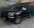 Черный Мицубиси Л 200, объемом двигателя 2.44 л и пробегом 14 тыс. км за 45000 $, фото 1 на Automoto.ua
