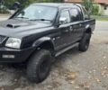 Черный Мицубиси Л 200, объемом двигателя 0.25 л и пробегом 280 тыс. км за 2900 $, фото 1 на Automoto.ua