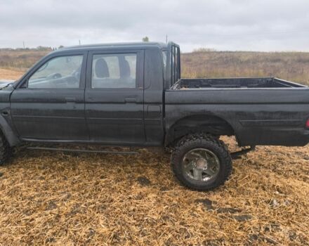 Чорний Міцубісі Л 200, об'ємом двигуна 0 л та пробігом 220 тис. км за 2800 $, фото 3 на Automoto.ua