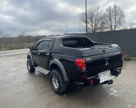 Чорний Міцубісі Л 200, об'ємом двигуна 2.5 л та пробігом 370 тис. км за 12750 $, фото 1 на Automoto.ua