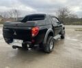 Чорний Міцубісі Л 200, об'ємом двигуна 2.5 л та пробігом 370 тис. км за 12750 $, фото 2 на Automoto.ua