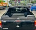 Черный Мицубиси Л 200, объемом двигателя 2.5 л и пробегом 150 тыс. км за 6000 $, фото 8 на Automoto.ua