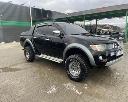 Чорний Міцубісі Л 200, об'ємом двигуна 2.5 л та пробігом 370 тис. км за 12750 $, фото 3 на Automoto.ua