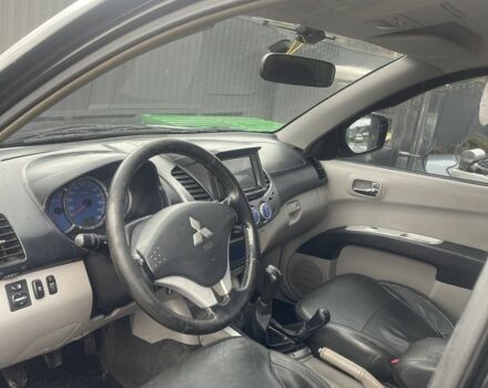 Чорний Міцубісі Л 200, об'ємом двигуна 2.5 л та пробігом 370 тис. км за 12750 $, фото 4 на Automoto.ua