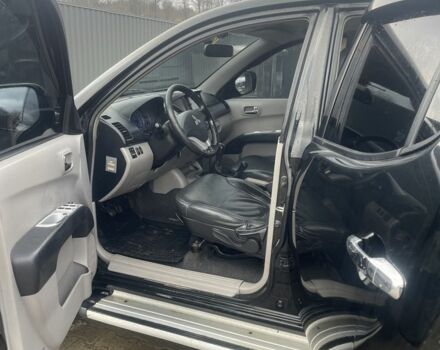 Чорний Міцубісі Л 200, об'ємом двигуна 2.5 л та пробігом 370 тис. км за 12750 $, фото 7 на Automoto.ua