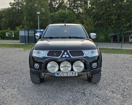 Черный Мицубиси Л 200, объемом двигателя 2.5 л и пробегом 182 тыс. км за 3800 $, фото 1 на Automoto.ua
