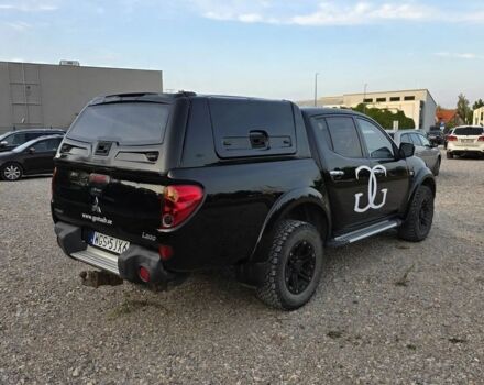 Черный Мицубиси Л 200, объемом двигателя 2.5 л и пробегом 182 тыс. км за 3800 $, фото 6 на Automoto.ua