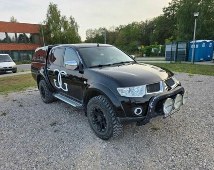 Черный Мицубиси Л 200, объемом двигателя 2.5 л и пробегом 182 тыс. км за 3800 $, фото 2 на Automoto.ua