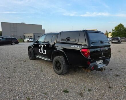 Черный Мицубиси Л 200, объемом двигателя 2.5 л и пробегом 182 тыс. км за 3800 $, фото 5 на Automoto.ua