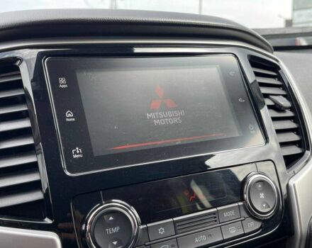 Черный Мицубиси Л 200, объемом двигателя 0 л и пробегом 58 тыс. км за 32900 $, фото 22 на Automoto.ua