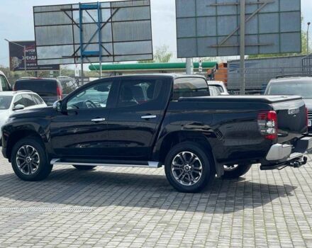 Черный Мицубиси Л 200, объемом двигателя 0 л и пробегом 58 тыс. км за 32900 $, фото 3 на Automoto.ua