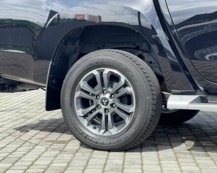 Черный Мицубиси Л 200, объемом двигателя 0 л и пробегом 58 тыс. км за 32900 $, фото 9 на Automoto.ua