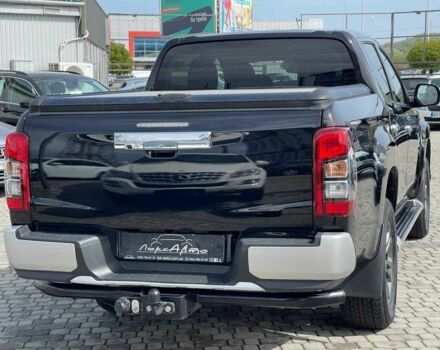 Черный Мицубиси Л 200, объемом двигателя 0 л и пробегом 58 тыс. км за 32900 $, фото 4 на Automoto.ua