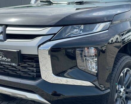 Черный Мицубиси Л 200, объемом двигателя 0 л и пробегом 58 тыс. км за 32900 $, фото 8 на Automoto.ua