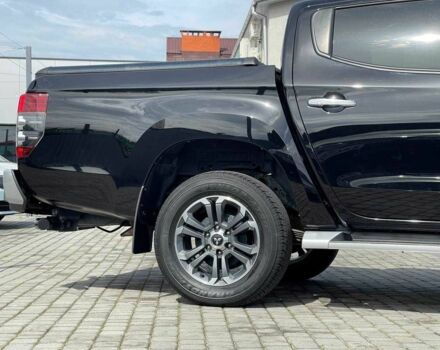 Черный Мицубиси Л 200, объемом двигателя 0 л и пробегом 58 тыс. км за 32900 $, фото 5 на Automoto.ua