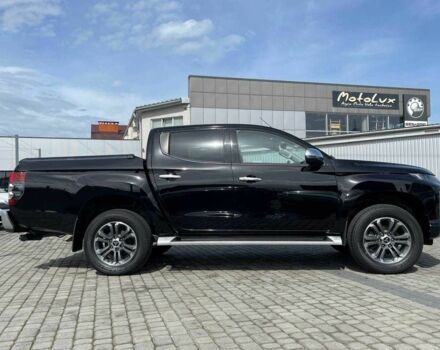 Черный Мицубиси Л 200, объемом двигателя 0 л и пробегом 58 тыс. км за 32900 $, фото 1 на Automoto.ua