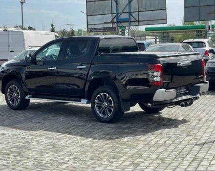 Черный Мицубиси Л 200, объемом двигателя 0 л и пробегом 58 тыс. км за 32900 $, фото 6 на Automoto.ua