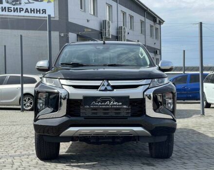 Черный Мицубиси Л 200, объемом двигателя 0 л и пробегом 58 тыс. км за 32900 $, фото 2 на Automoto.ua