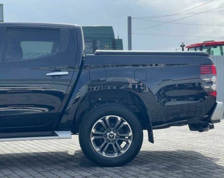 Черный Мицубиси Л 200, объемом двигателя 0 л и пробегом 58 тыс. км за 32900 $, фото 12 на Automoto.ua