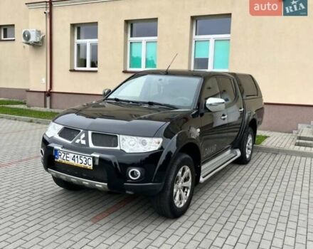 Чорний Міцубісі Л 200, об'ємом двигуна 2.5 л та пробігом 240 тис. км за 2700 $, фото 1 на Automoto.ua