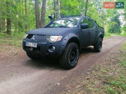 Чорний Міцубісі Л 200, об'ємом двигуна 2.5 л та пробігом 285 тис. км за 3000 $, фото 1 на Automoto.ua