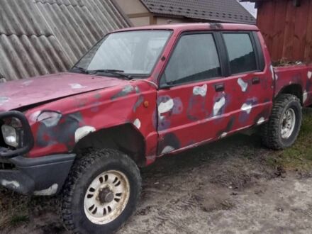 Черный Мицубиси Л 200, объемом двигателя 2.5 л и пробегом 300 тыс. км за 2200 $, фото 1 на Automoto.ua