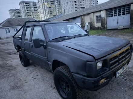 Черный Мицубиси Л 200, объемом двигателя 2.5 л и пробегом 310 тыс. км за 2700 $, фото 1 на Automoto.ua