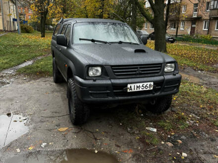 Мицубиси Л 200 1997 в Полтаве на Automoto.ua Черный Мицубиси Л 200, объемом двигателя 2.5 л и пробегом 600 тыс. км за 6500 $, фото 1 на Automoto.ua