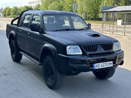 Міцубісі Л 200 1998 у Белой Церкве на Automoto.ua Чорний Міцубісі Л 200, об'ємом двигуна 2.5 л та пробігом 200 тис. км за 4450 $, фото 1 на Automoto.ua