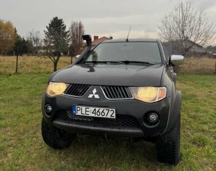 Черный Мицубиси Л 200, объемом двигателя 2.5 л и пробегом 236 тыс. км за 3700 $, фото 1 на Automoto.ua