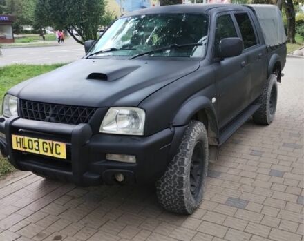Чорний Міцубісі Л 200, об'ємом двигуна 2.5 л та пробігом 260 тис. км за 5000 $, фото 1 на Automoto.ua