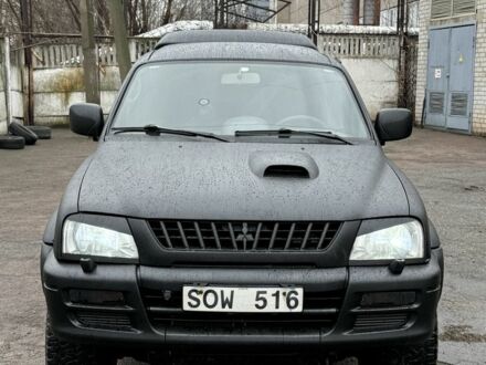 Чорний Міцубісі Л 200, об'ємом двигуна 0 л та пробігом 291 тис. км за 5499 $, фото 1 на Automoto.ua